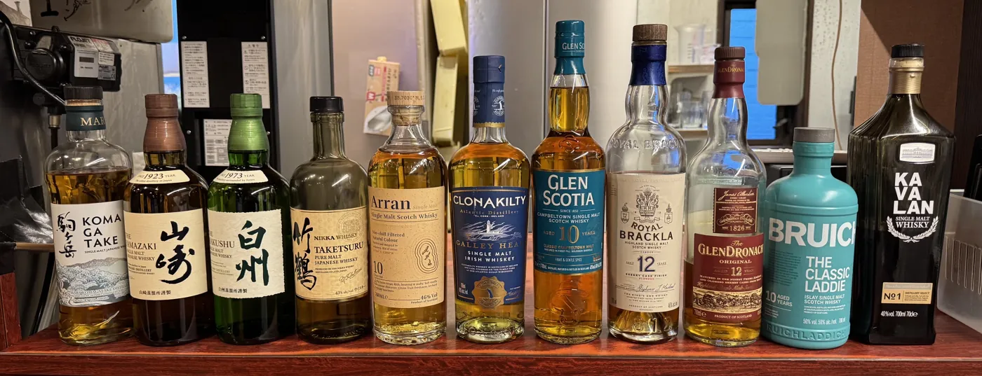 A row of single malt and Japanese whiskies